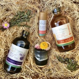 winter wellness holiday gift set with elderberry syrup, fire cider, herbal healing salve and ceramic cup